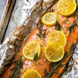Easy Baked Salmon in Foil with Garlic, Lemon, and Herbs.