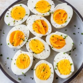a plate of the BEST air fryer hard boiled eggs