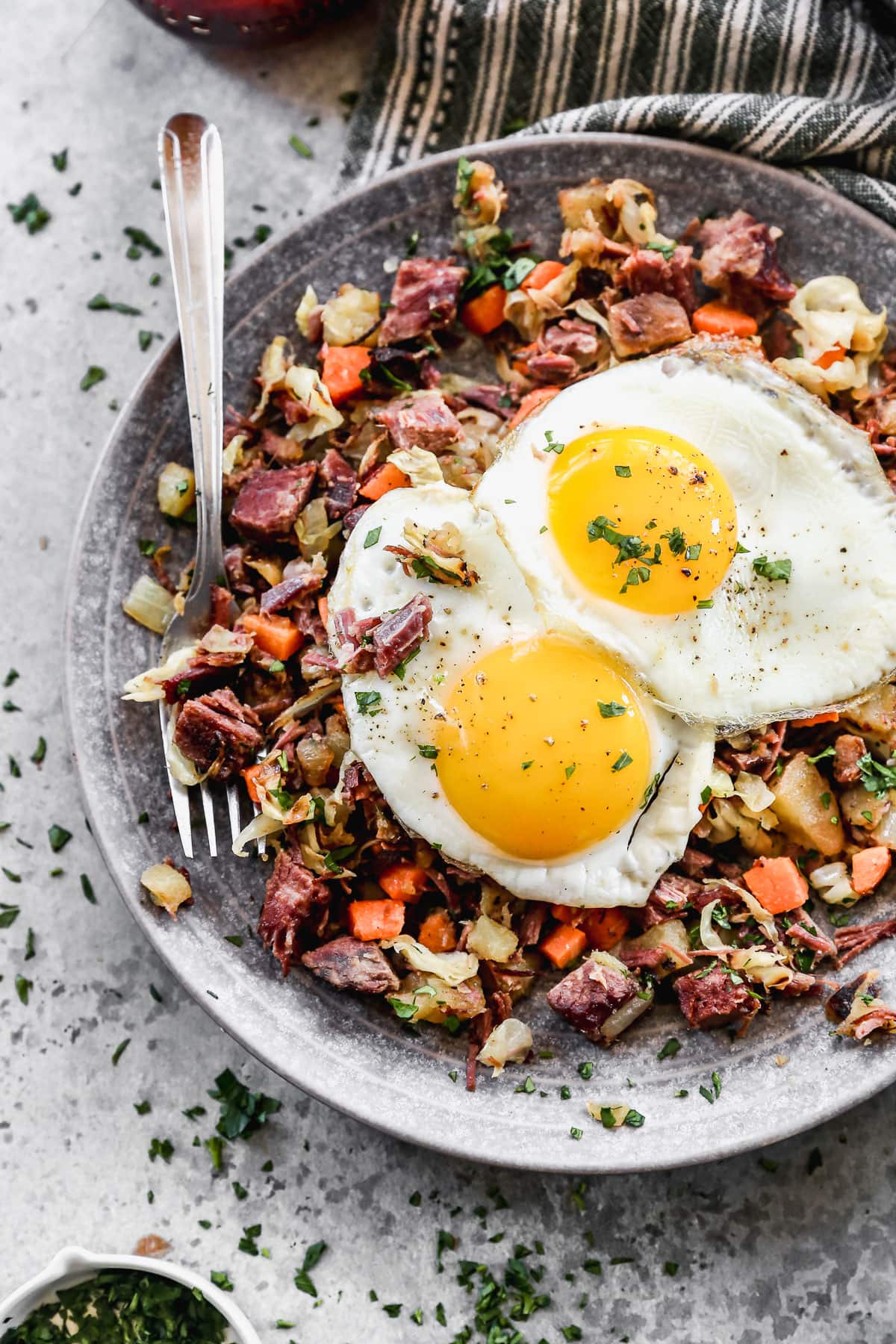 the best corned beef hash recipe in a bowl