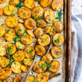 a sheet pan of crispy roasted potatoes baked in the oven