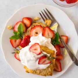 Easy gluten free strawberry shortcake recipe made with Greek yogurt and oatmeal. Fluffy, tender shortcakes that taste like the real-deal! The perfect summer dessert and delicious with fresh strawberries, peaches, blueberries, or any of your favorite summer fruits.