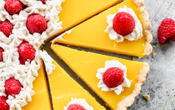 lemon tart recipe no bake topped with berries and whipped cream