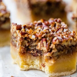 pecan pie bars made with maple syrup with shortbread crust