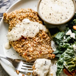 Pecan crusted chicken breast on a plate