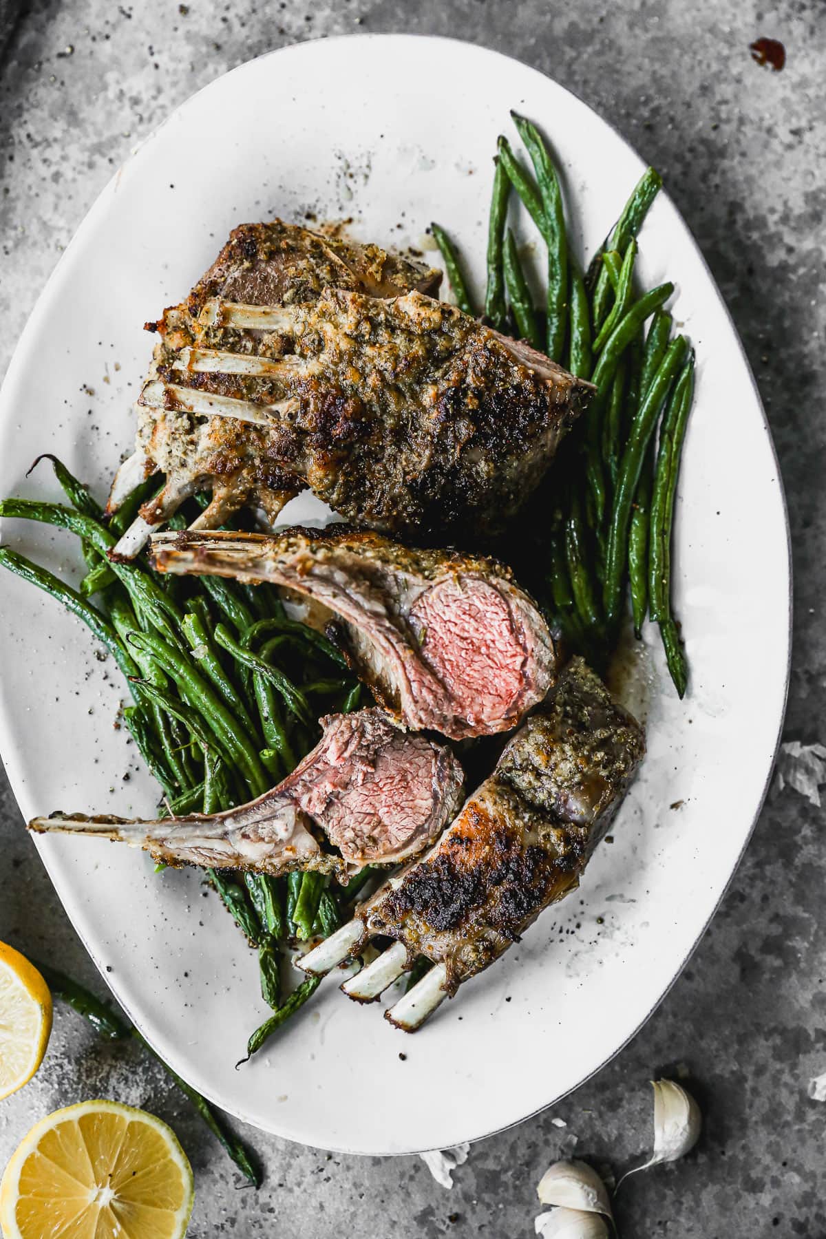 a serving platter the best rack of lamb recipe with vegetables