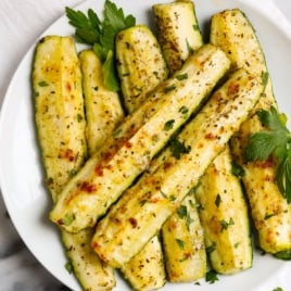 a plate with the best roasted zucchini spears
