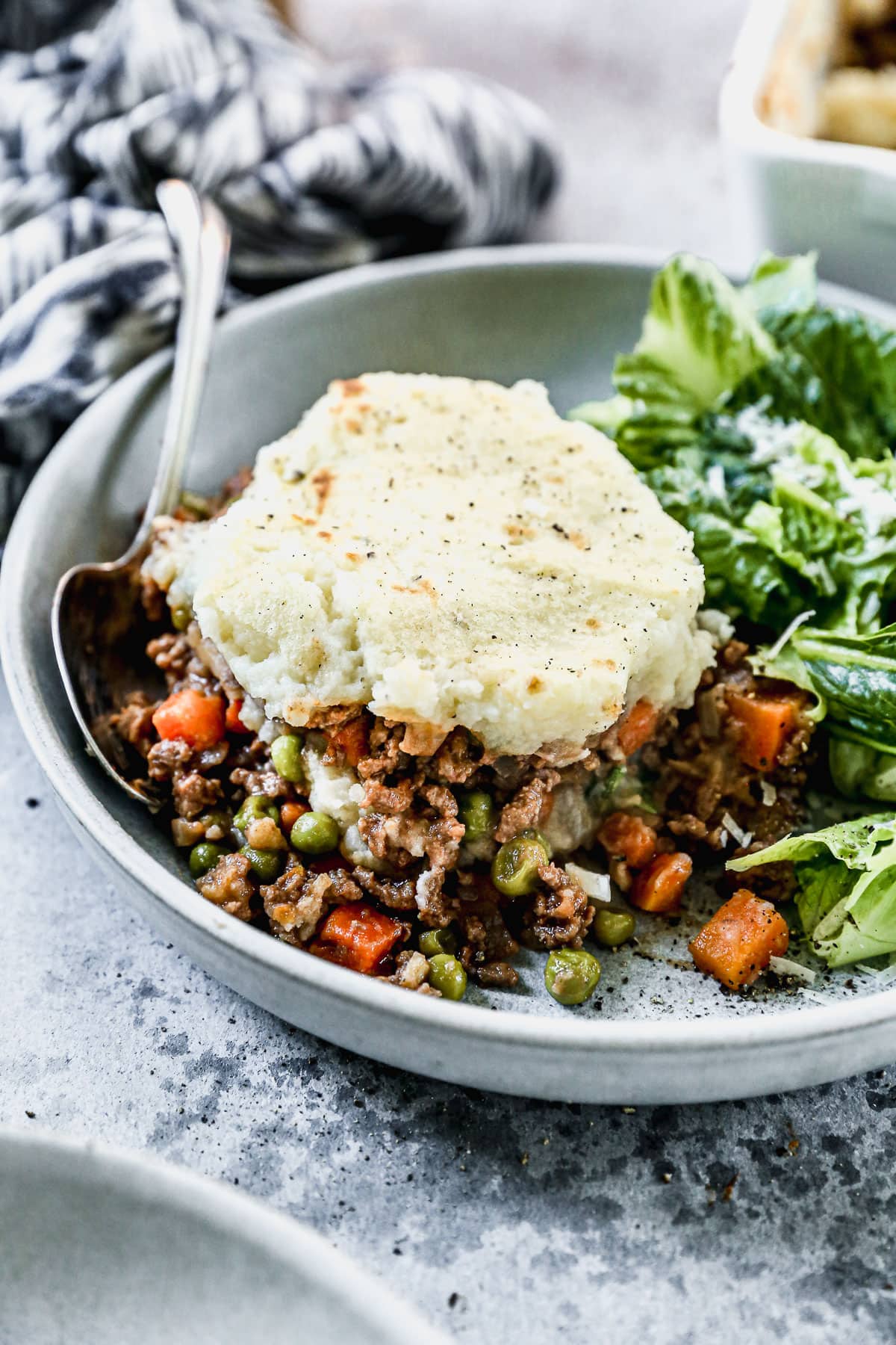 Easy shepherd's pie served on a plate with lettuce