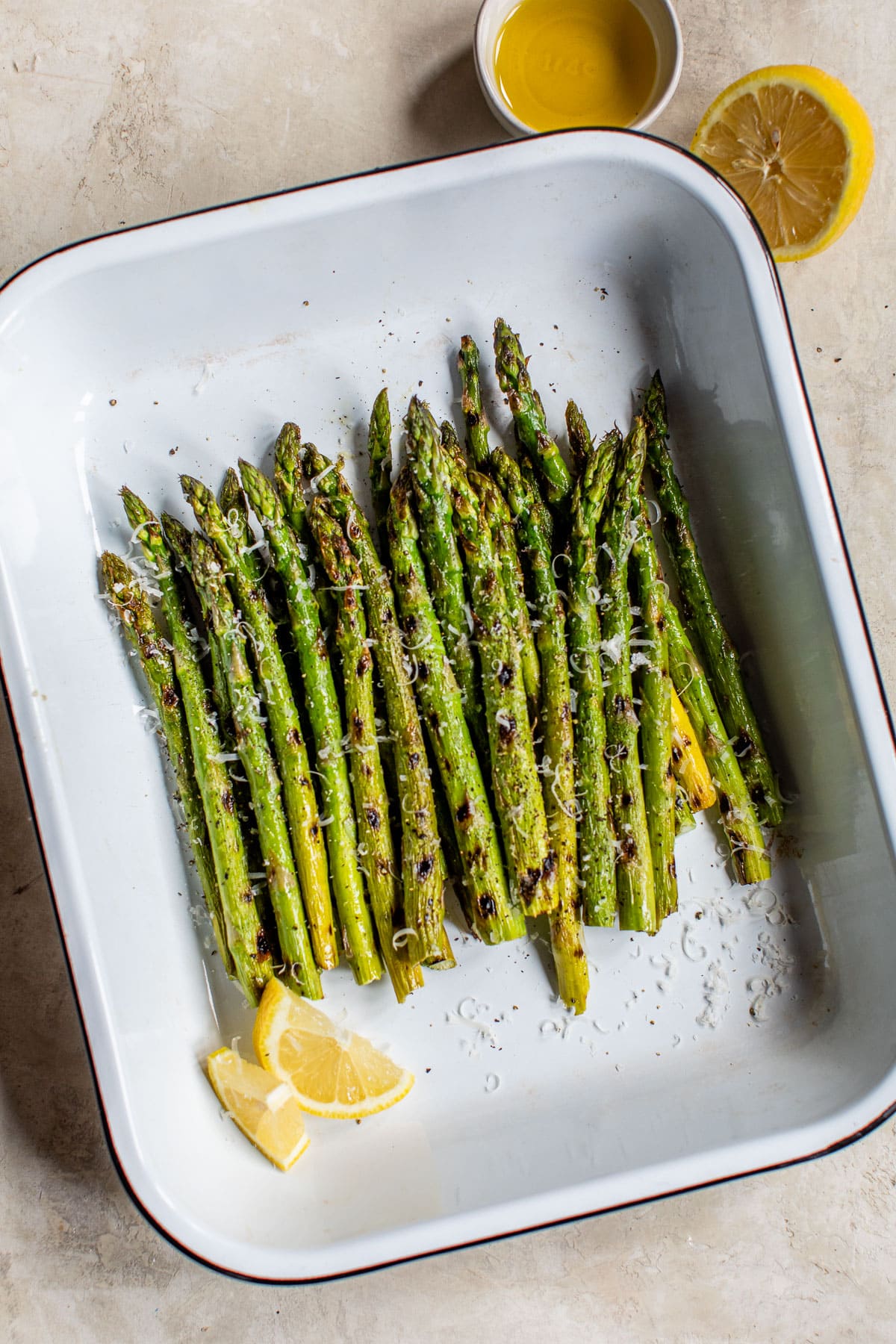 Healthy grilled asparagus in a baking dish