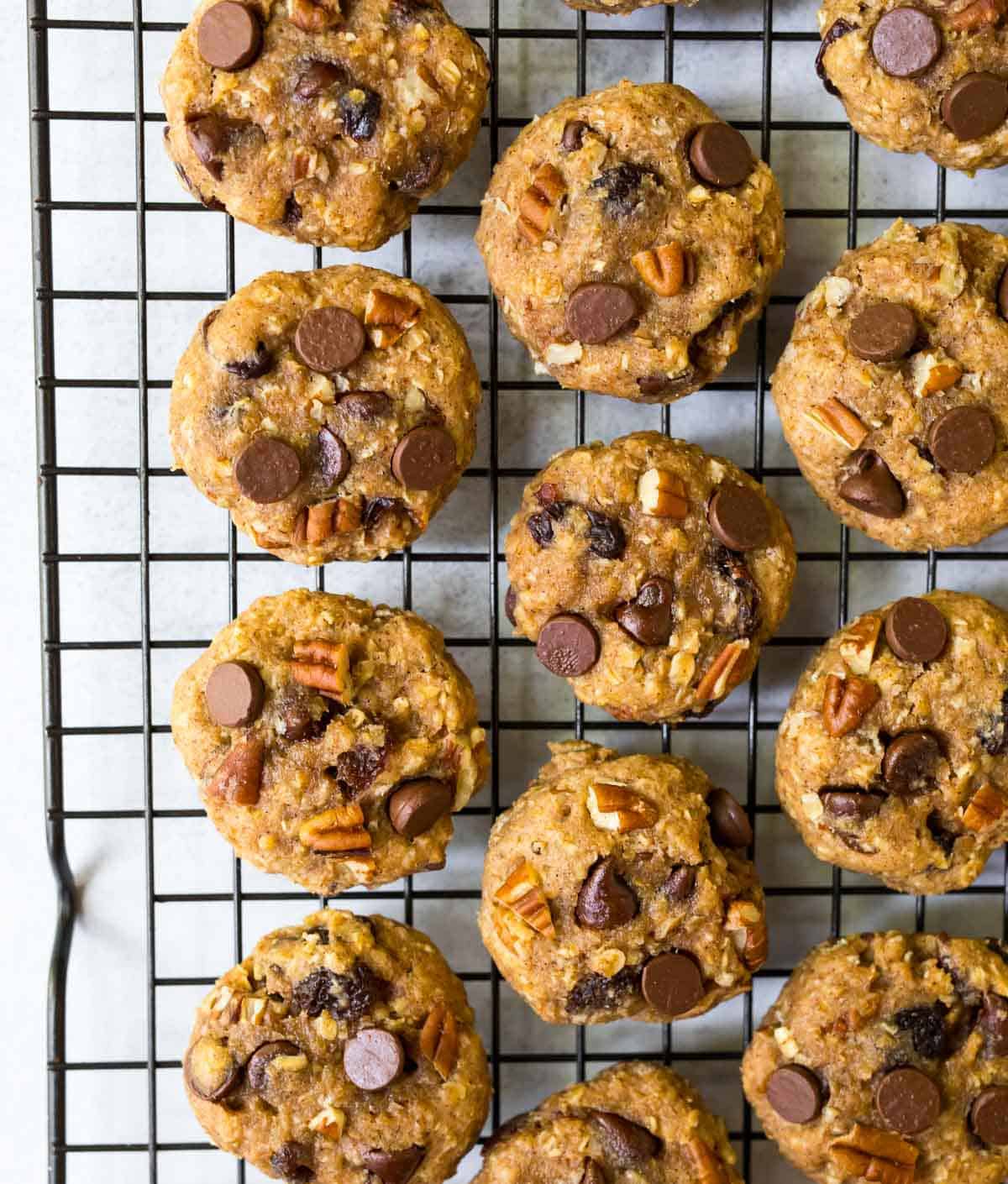 Crazy healthy oatmeal cookies with chocolate chips and nuts on a cooling rack