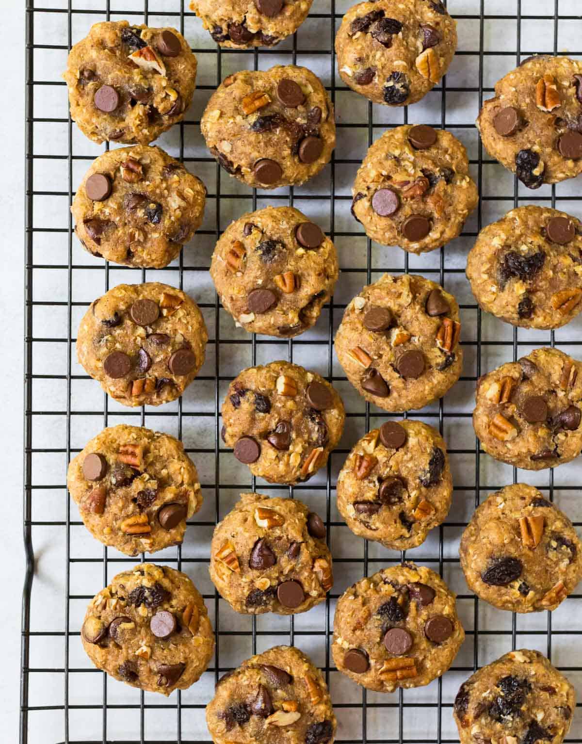 Delicious and chewy cookies with chocolate chips and nuts on a cooling rack
