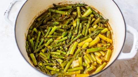 making healthy asparagus soup in a large pot