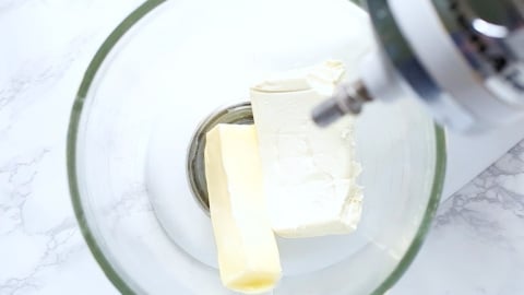 butter and cream cheese in a mixer for frosting