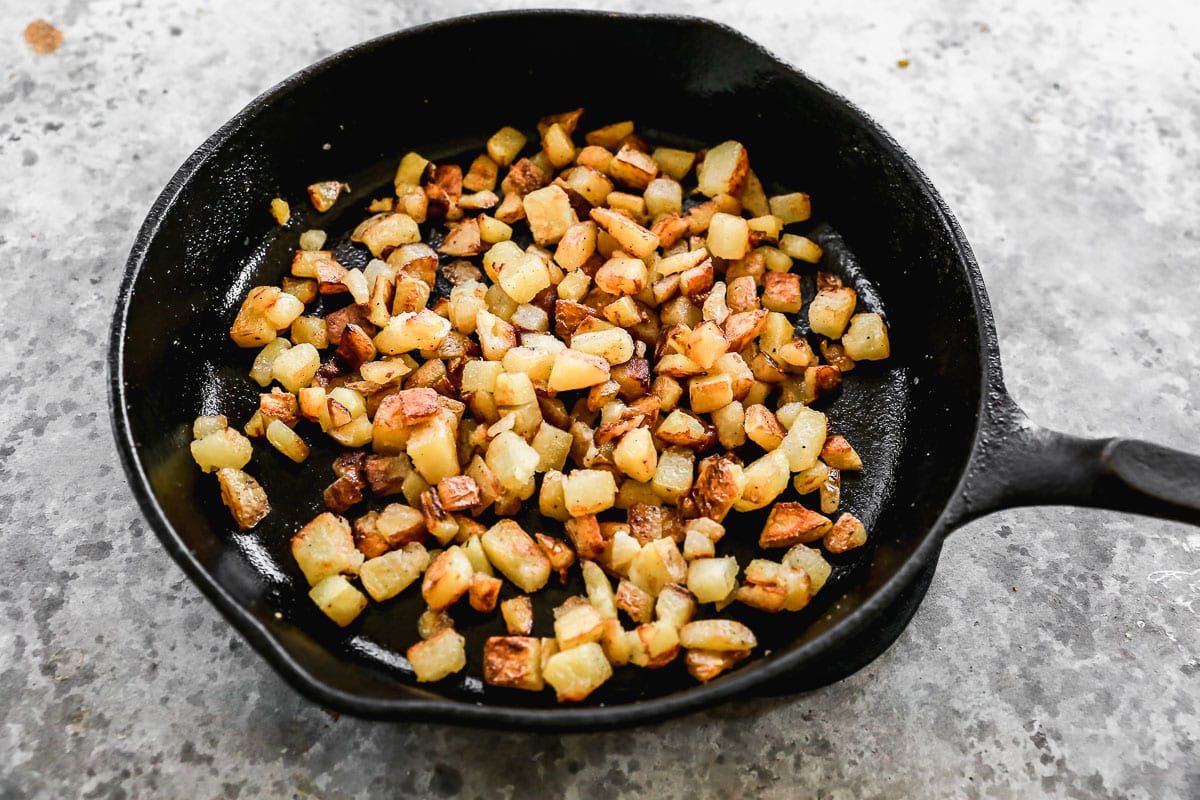 breakfast potatoes on a skillet for corned beef hash