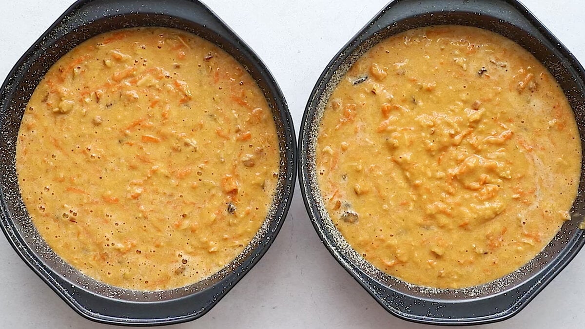 Two pans of gluten-free carrot cake batter