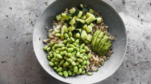 edamame, cucumber, and avocado added to rice for bowls