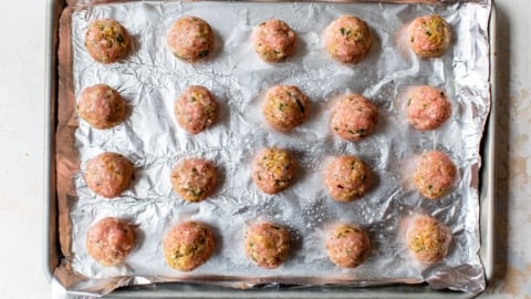 a baking sheet of healthy turkey meatballs
