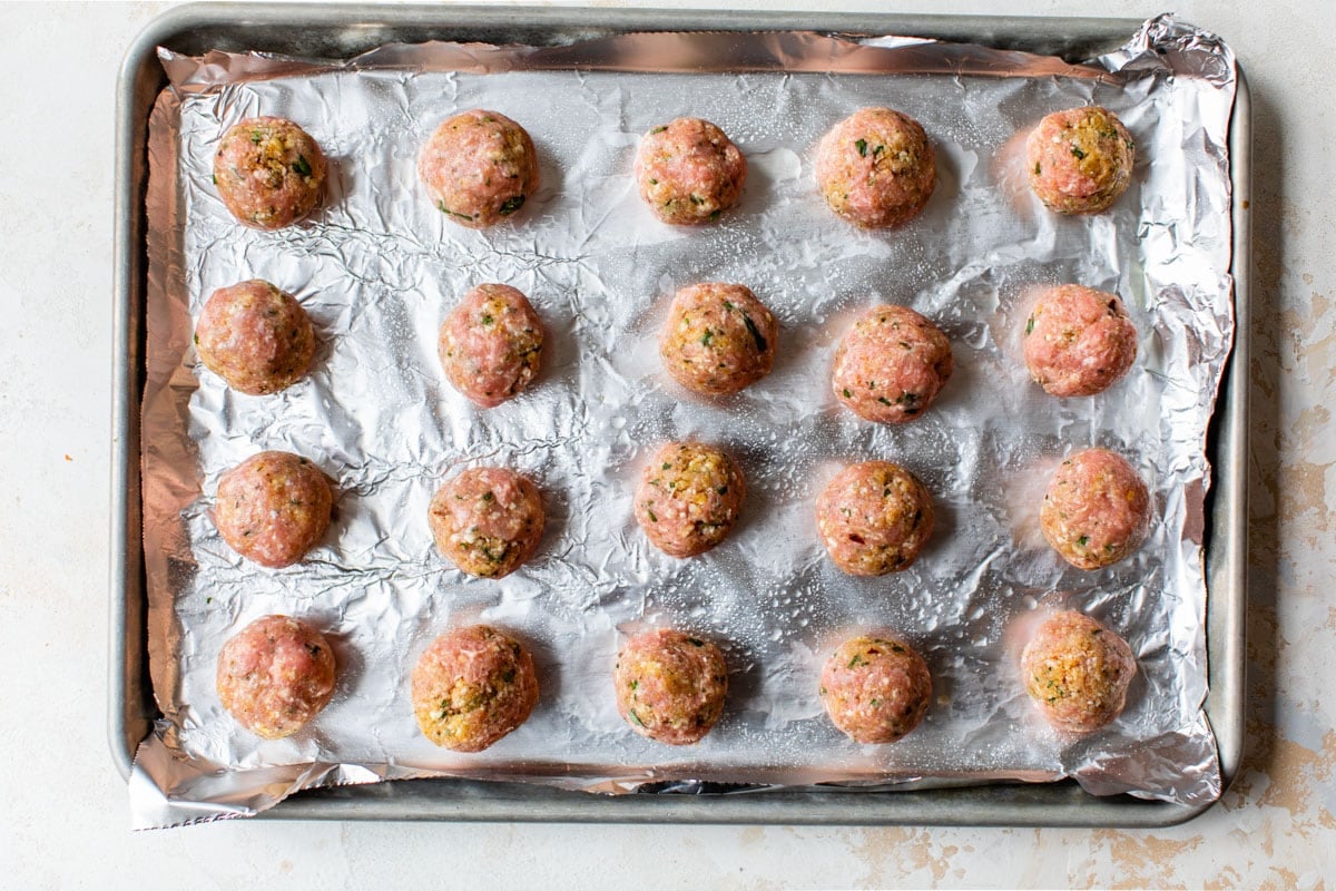 a baking sheet of healthy turkey meatballs