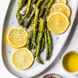 Lemon slices and roasted asparagus