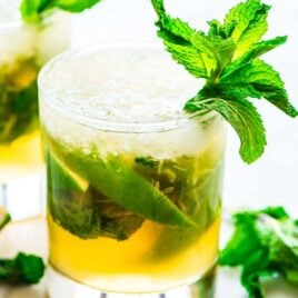 Irish Whiskey Smash — St. Patrick’s Day twist on the classic whiskey smash cocktail, which calls for lemons, whiskey, simple syrup, mint. This festive version uses Irish whiskey and lime to make it a green drink! Recipe at wellplated.com | @wellplated