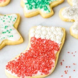 The BEST Cut Out Sugar Cookies from scratch with no-fail icing. A foolproof Christmas cookie recipe that even kids can make!