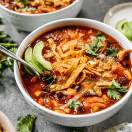 a bowl of quick and easy chicken enchilada soup