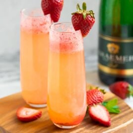 Best Strawberry Champagne in two champagne glasses