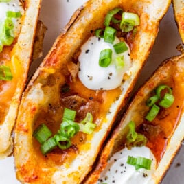 Loaded potato skins with green onion and cheese