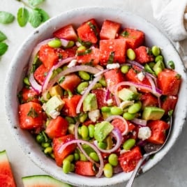 a large bowl of refreshing summer watermelon salad